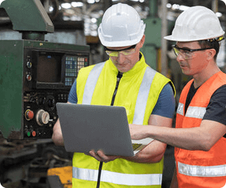 Supervisors evaluating employee safety training performance on site